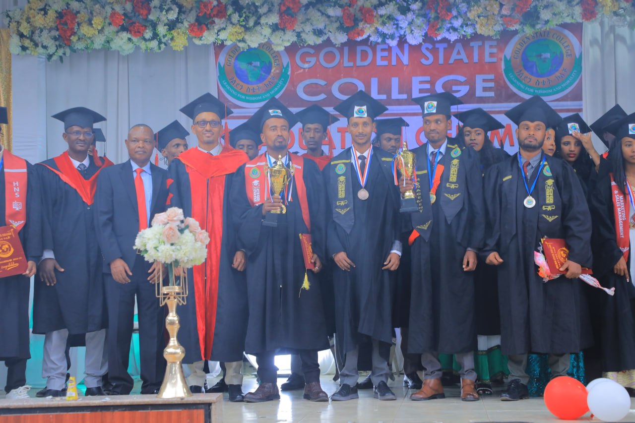 College graduates celebrating with medals and trophies
